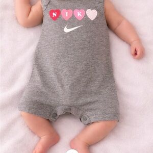 Newborn Nike Gray Onesie with Heart Accents